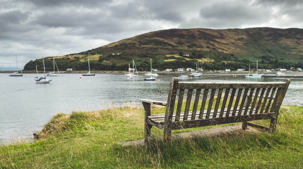 Close-up bench with bayview. Arran. Scotland