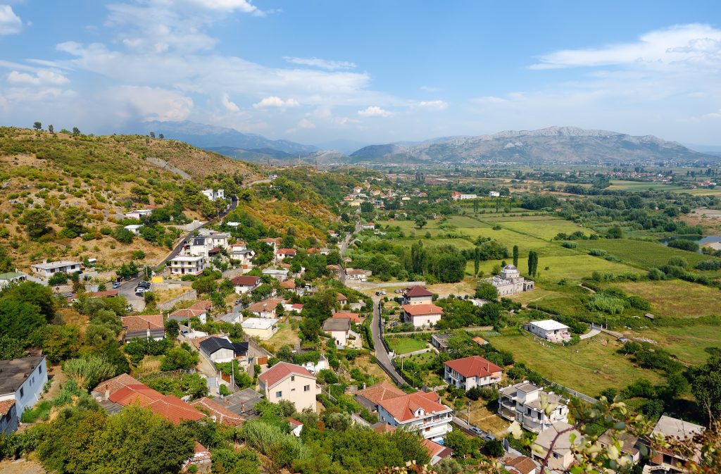 Picturesque view of neighborhoods Skodra in Albania on the background of mountains