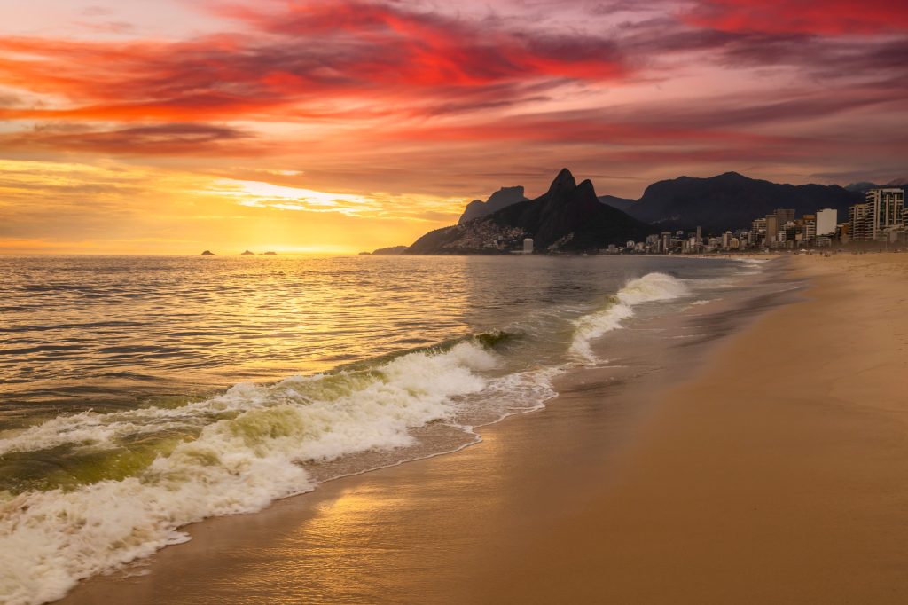 Sunset on the ocean at Rio de Janeiro, Ipanema beach. Brazil